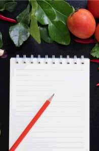 notebook-and-food-calorie-count